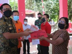 Bupati Joune Ganda Salurkan Bansos Tahap II Untuk Ribuan PKM di Minut